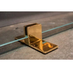 Manhattan Modern Freestanding Glass Fireplace Screen | AMS Fireplace -Fireplace Shop ClearBronzeFeetCloseUp web 29697.1595894305